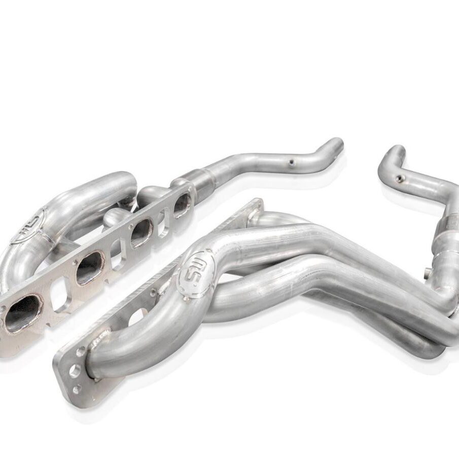 Chrome exhaust headers for a car engine.